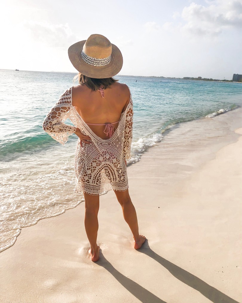 fashion blogger wearing crochet cover up from amazon on seven mile beach