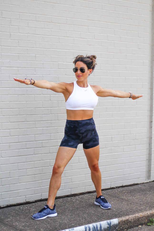 lifestyle and fashion bloggers samantha and alexis belbel of A Double Dose wearing lululemon summer pieces - blue running shorts and white strappy sports bra and camo align shorts and white bra