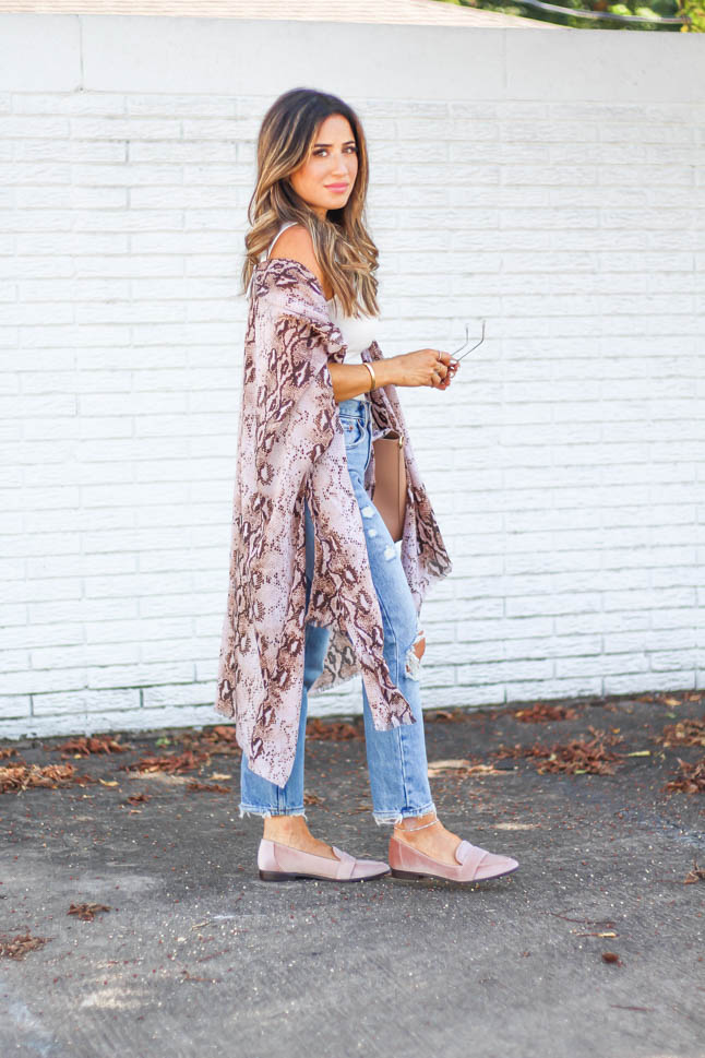 fashion and lifestyle blogger samantha belbel wearing a python print kimono with an ivory bodysuit and distressed girlfriend jeans with pointed blush velvet loafers from sole society 