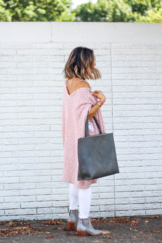 fashion and lifestyle blogger alexis belbel of a double dose wearing white ripped jeans for petites from abercrombie, a white lace cami from express, a pink wrap sweater from sole society and a grey tote bad and grey booties from sole society.