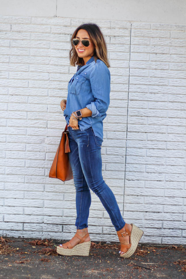 fashion blogger alexis belbel of a double dose wearing a denim button down shirt and skinny dark jeans for petites from express with a tan tote bag from sole society and some sam edelman neutral espadrille wedges 