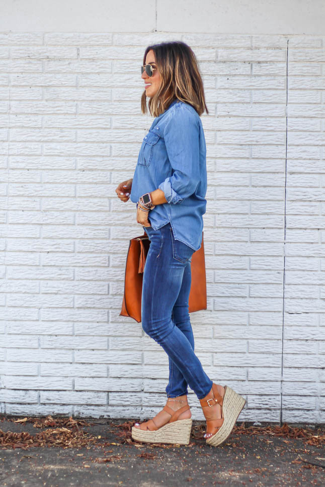fashion blogger alexis belbel of a double dose wearing a denim button down shirt and skinny dark jeans for petites from express with a tan tote bag from sole society and some sam edelman neutral espadrille wedges 