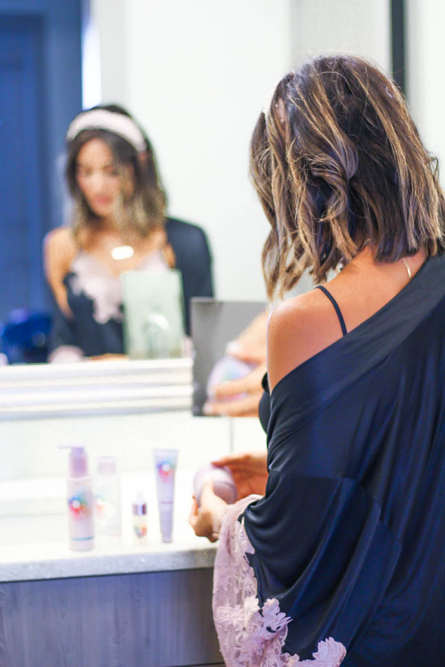 lifestyle blogger alexis belbel of a double dose shares her personalized skincare routine with Skinsei based on her diagnostic wearing a Natori lace pajama set