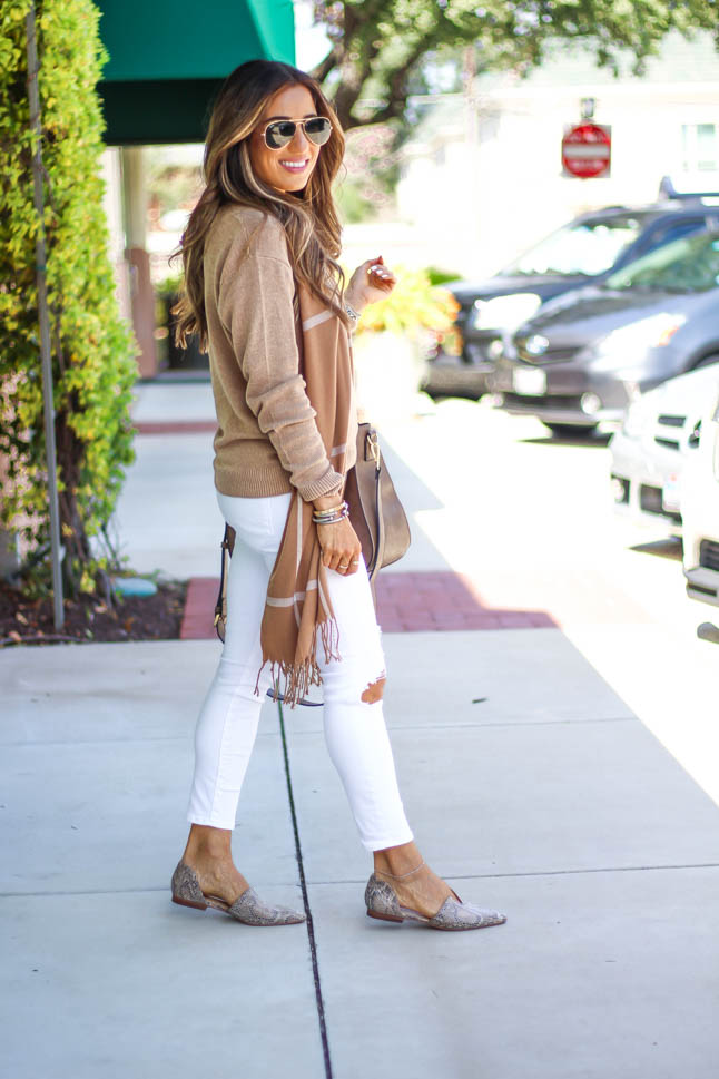 lifestyle and fashion blogger samantha belbel of a double dose wearing a tan neutral sweater from express with white jeans with rips, a neutral windowpane fringe scarf, a suede satchel bag from sole society, and snakeskin python pointed flats for a fall outfit
