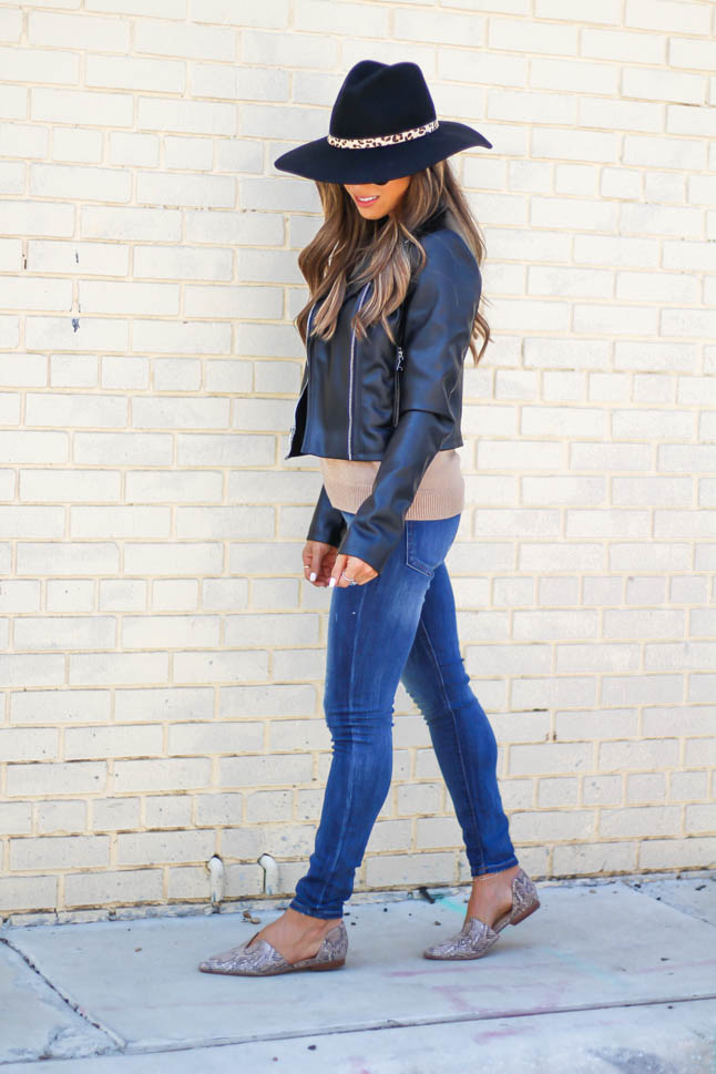 lifestyle and fashion blogger samantha belbel of a double dose wearing a faux leather moto jacket with a tan sweater, dark skinny jeans from Express, a black wool hat for fall and snakeskin printed pointed flats 