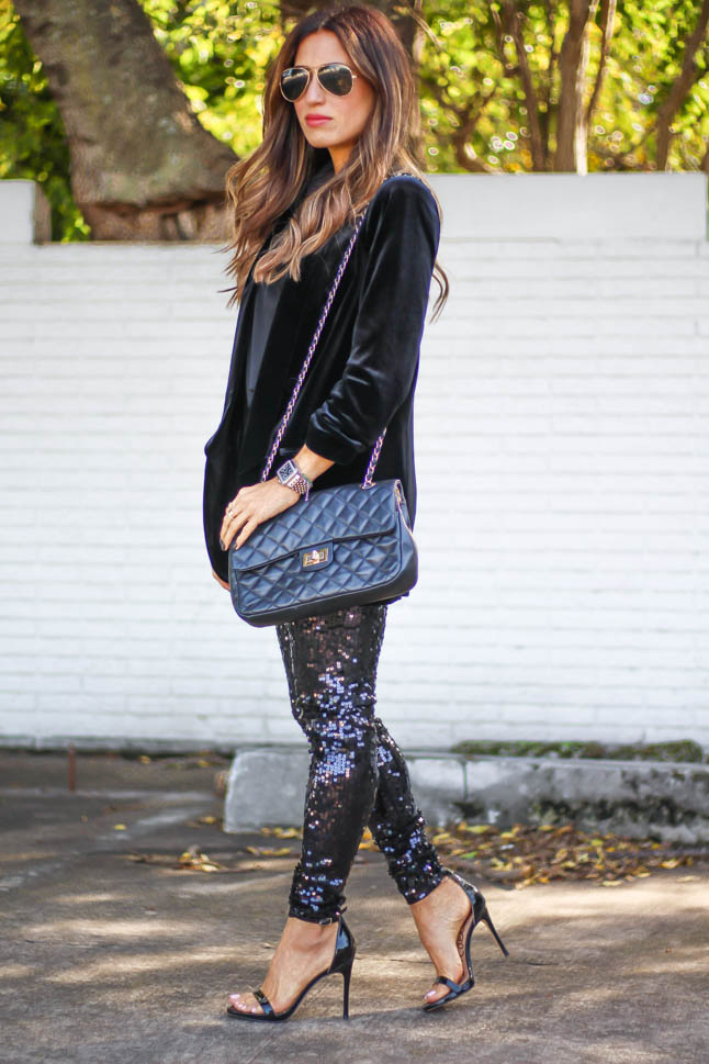 lifestyle and fashion blogger wearing a head to toe look for the holidays from express: black sequin leggings, black velvet blazer, black cami, black sandal from sam edelman | adoubledose.com