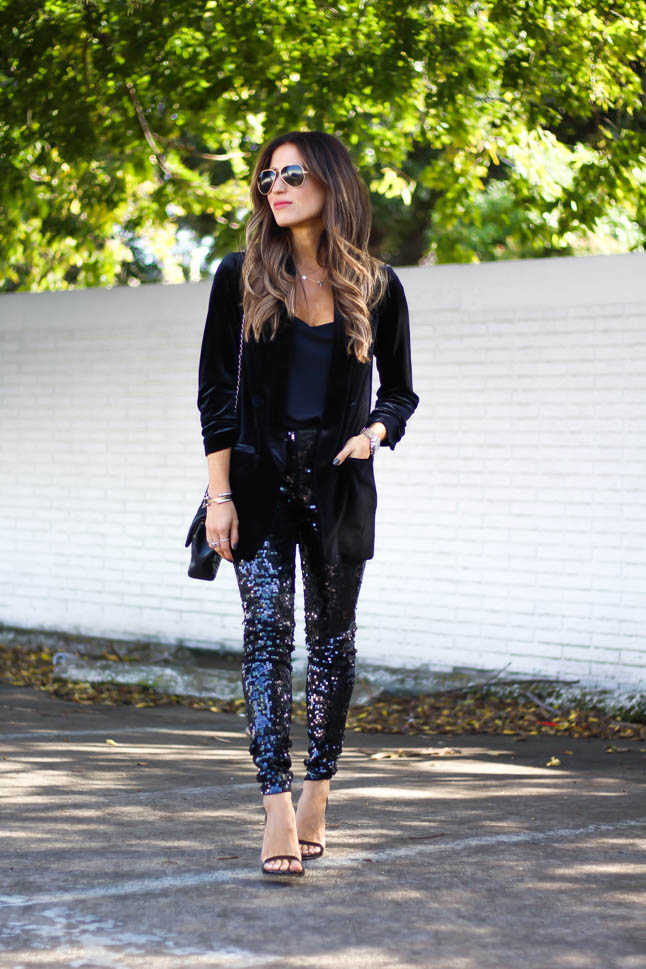 lifestyle and fashion blogger wearing a head to toe look for the holidays from express: black sequin leggings, black velvet blazer, black cami, black sandal from sam edelman | adoubledose.com