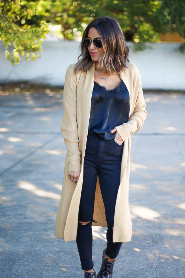 lifestyle and fashion blogger alexis belbel wearing neutral cardigan, black lace cami, ripped black jeans and snakeskin vince camuto booties all from Nordstrom | adoubledose.com