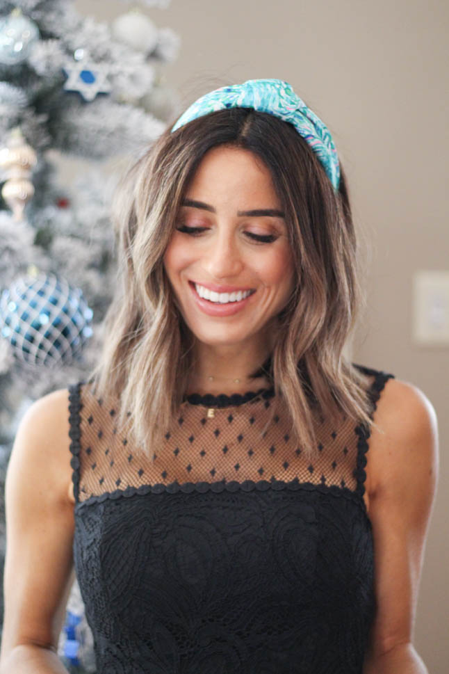 lifestyle and fashion blogger alexis belbel wearing black lace Lilly Pulitzer dress for the holidays with Resort Ready Glamour Promos hair accessories | adoubledose.com