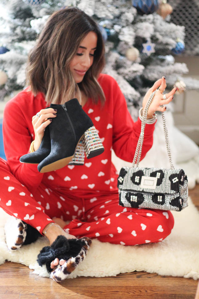 lifestyle and fashion blogger alexis belbel sharing gifts for your best friend, sister, cousin, aunt, for her Betsey Johnson. Wearing red heart pajama set and leopard fuzzy slippers | adoubledose.com