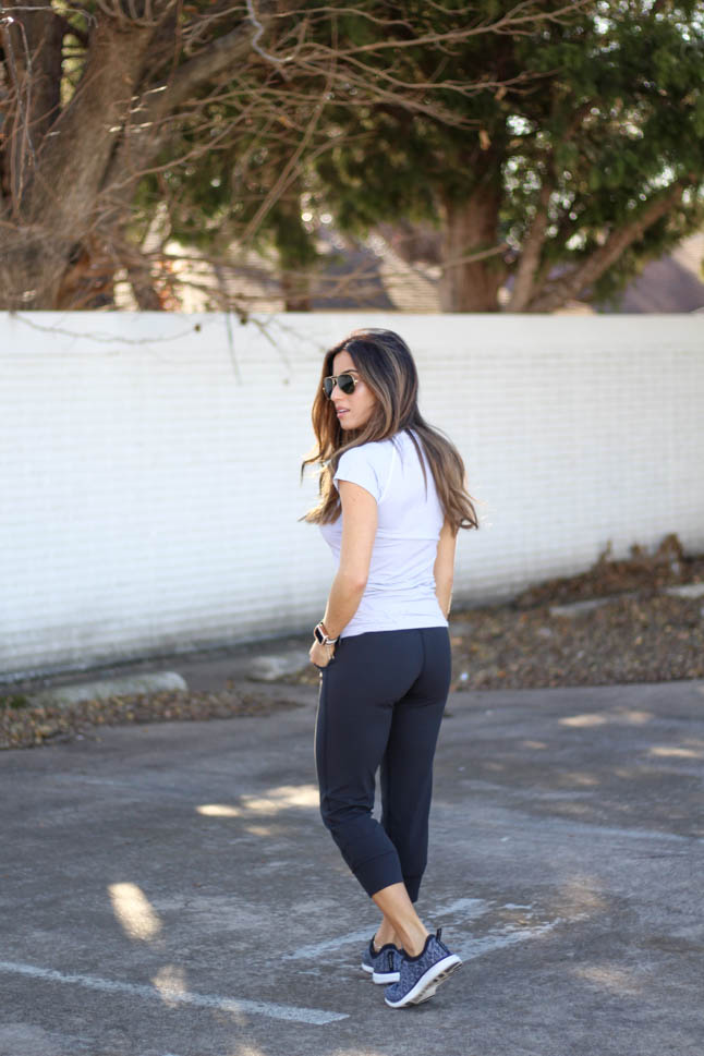 lifestyle and fashion blogger samantha belbel wearing black lululemon align joggers with lululemon short sleeve swiftly crew neck top and apl sneakers  | adoubledose.com