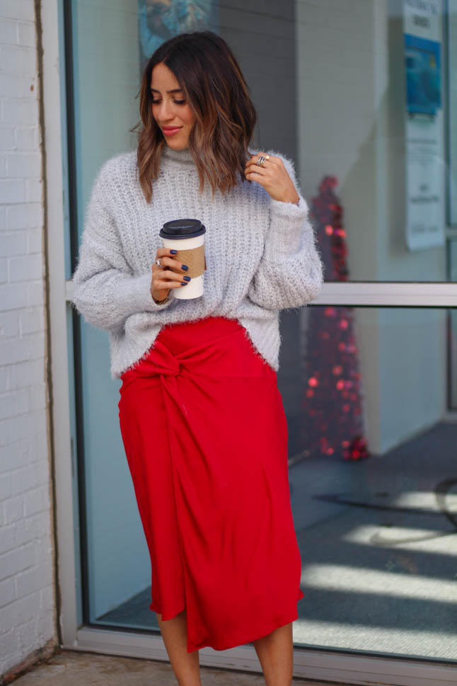 lifestyle and fashion blogger alexis belbel wearing a red satin skirt and fuzzy sweater from express with snakeskin pointed pumps | adoubledose.com