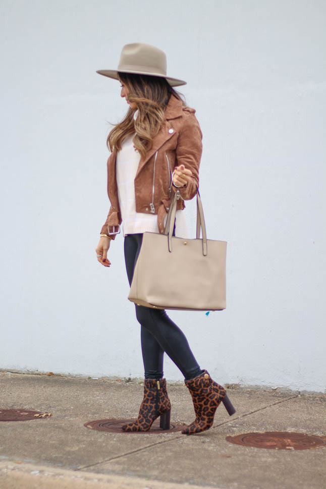 lifestyle and fashion blogger samantha belbel wearing leopard pointed booties from sole society, suede moto jacket from blanknyc, spanx faux leather leggings and a neutral floppy hat | adoubledose.com