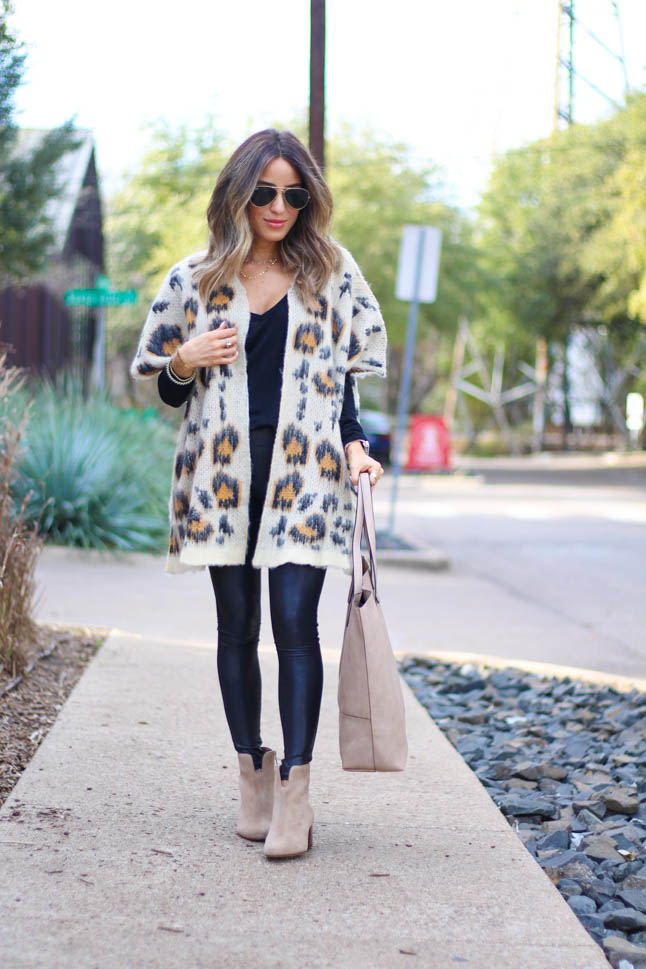 lifestyle and fashion blogger alexis belbel wearing a leopard cardigan sweater from sole society with suede booties from sole society with spanx faux leather leggings and a taupe tote bag from sole society| adoubledose.com