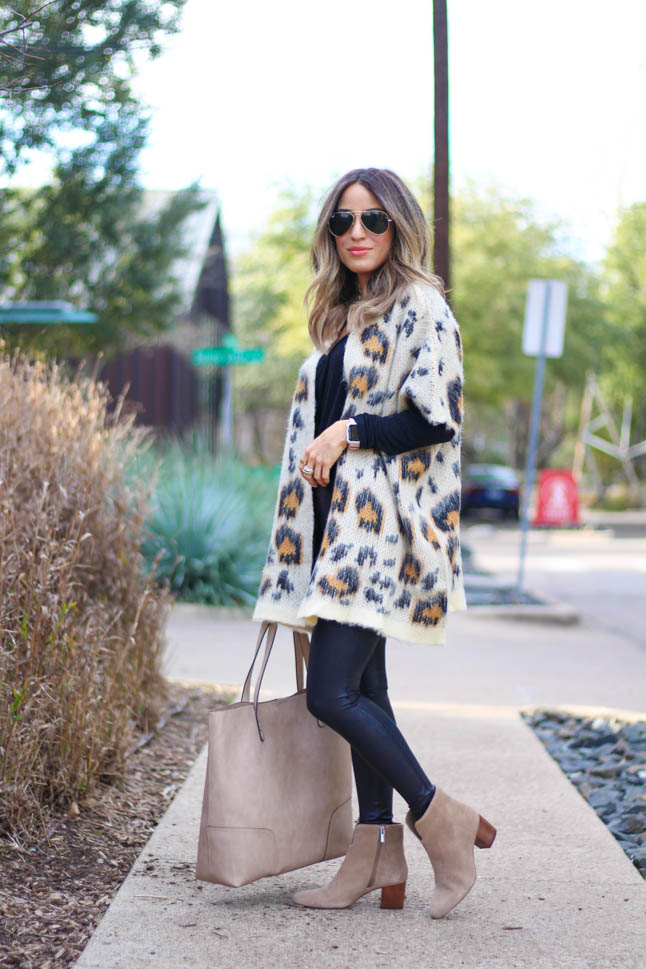 lifestyle and fashion blogger alexis belbel wearing a leopard cardigan sweater from sole society with suede booties from sole society with spanx faux leather leggings and a taupe tote bag from sole society| adoubledose.com