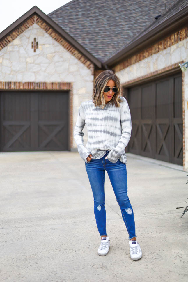 lifestyle and fashion blogger alexis belbel shares a spring transitional look from walmart fashion wearing skinny distressed jeans from sofia jeans and a tie dye thermal top from sofia jeans and golden goose sneakers| adoubledose.com
