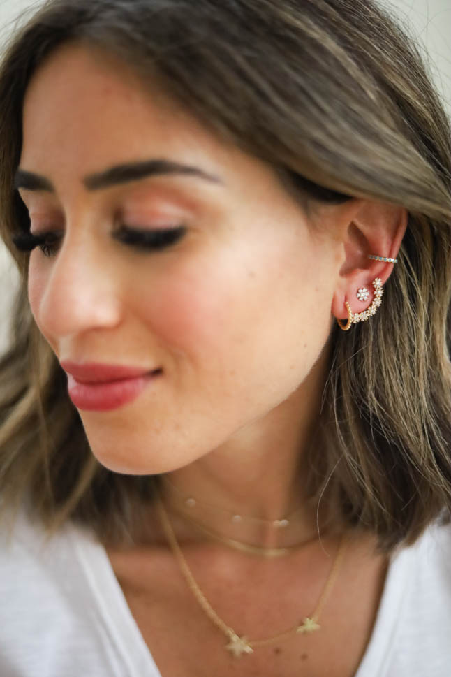 lifestyle and fashion blogger alexis belbel sharing how to layer earrings and jewelry from nordstrom like ear crawlers, ear cuffs, and more| adoubledose.com