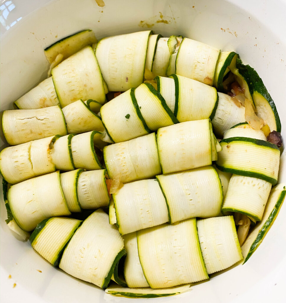 lifestyle and fashion blogger alexis belbel shares how to make low carb, vegan zucchini wrapped enchiladas at home with simple ingredients in your kitchen | adoubledose.com