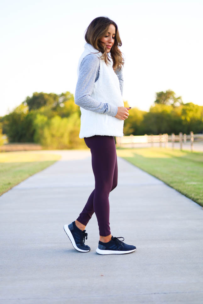 lifestyle and fashion blogger alexis belbel sharing a fall walking outfit from backcountry wearing a patagonia los gatos vest with alo airlift leggings and sharing benefit of walking outdoors | adoubledose.com