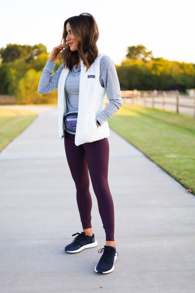 lifestyle and fashion blogger alexis belbel sharing a fall walking outfit from backcountry wearing a patagonia los gatos vest with alo airlift leggings and sharing benefit of walking outdoors | adoubledose.com