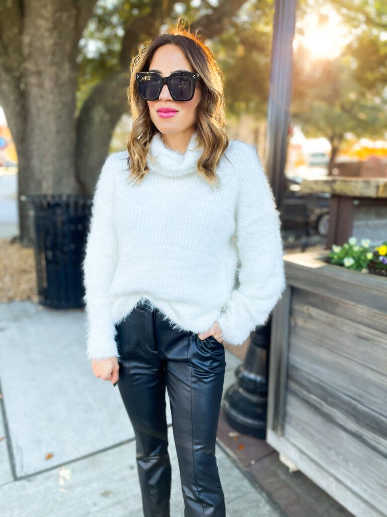 10 Things We Have Learned in 2020 wearing faux leather pants from expess with a cowl neck sweater and black pumps nye outfit idea | adoubledose.com