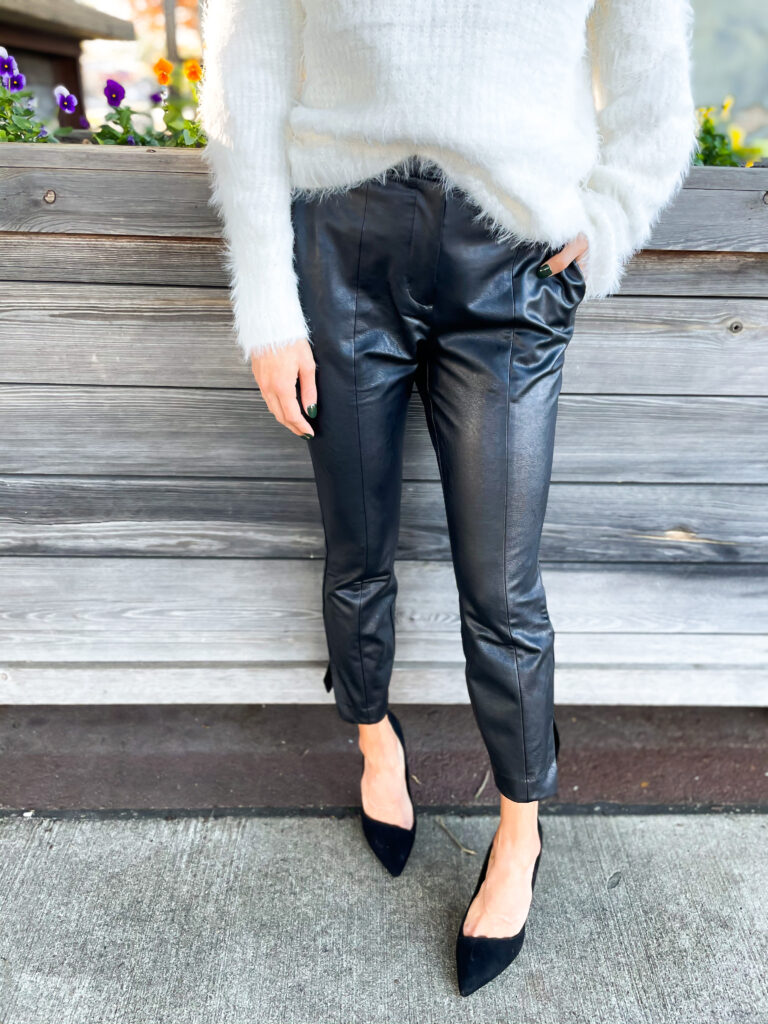 10 Things We Have Learned in 2020 wearing faux leather pants from expess with a cowl neck sweater and black pumps nye outfit idea | adoubledose.com