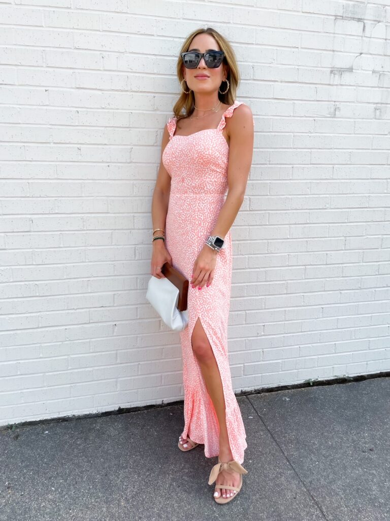 lifestyle and fashion bloggers alexis and samantha belbel share some summer wedding guest dresses from Express: a black asymmetrical dress and a maxi dress with heels | adoubledose.com