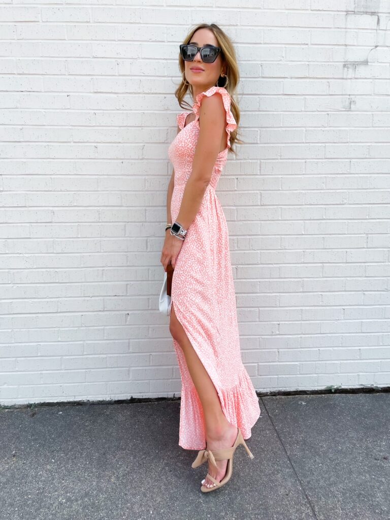 lifestyle and fashion bloggers alexis and samantha belbel share some summer wedding guest dresses from Express: a black asymmetrical dress and a maxi dress with heels | adoubledose.com