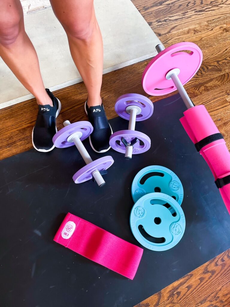 lifestyle and fashion blogger samantha belbel shares a full body at home workout using Booty Bands resistance bands, dumbbells, and barbell | adoubledose.com